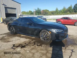 2019 BMW 8 Series M850i xDrive with VIN WBABC4C50KBJ35899, listed as a Copart auction lot 74049574 with 60,220 mi miles and Salvage Title. Bid and sale history available at carsss.com. Image 4.