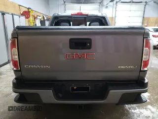 2019 GMC Canyon 4WD Denali with VIN 1GTG6EEN1K1360440, listed as a Copart auction lot 42479845 with 79,200 mi miles and Clean Title. Bid and sale history available at carsss.com. Image 6.