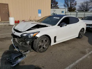 2021 Kia Stinger GT-Line with VIN KNAE15LA3M6098185, listed as a Copart auction lot 77583563 with 70,852 mi miles and Salvage Title. Bid and sale history available at carsss.com. Image 1.