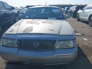 2004 Mercury Grand Marquis GS with VIN 2MEFM74W34X677247, listed as a IAAI auction lot 41856970 with 135,225 mi miles and . Bid and sale history available at DreamBid. Image 11.