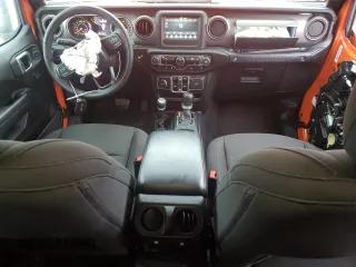 2023 Jeep Wrangler Sport Altitude with VIN 1C4HJXDG7PW675321, listed as a Copart auction lot 45138765 with 10,269 mi miles and Salvage Title. Bid and sale history available at DreamBid. Image 8.