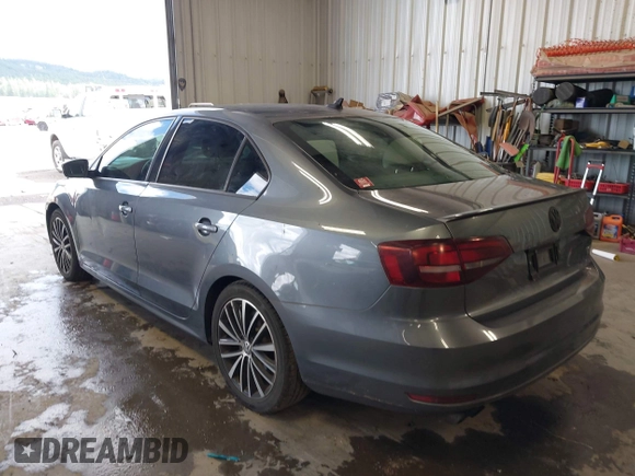 2016 Volkswagen Jetta Sport z VIN 3VWD17AJ8GM410208, wystawiony jako IAAI lot #42237019 z przebiegiem 67 137 mil mil oraz . Historia ofert i sprzedaży dostępna na DreamBid. Obrazek 3.