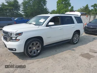 2017 Chevrolet Tahoe LT z VIN 1GNSKBKC2HR330422, wystawiony jako IAAI lot #42419205 z przebiegiem 136 444 mil mil oraz . Historia ofert i sprzedaży dostępna na DreamBid. Obrazek 17.