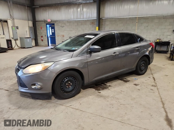 2012 Ford Focus SE with VIN 1FAHP3F28CL208855, listed as a Copart auction lot 63766165 with 168,183 mi miles and Salvage title. Bid and sale history available at DreamBid. Image 1.