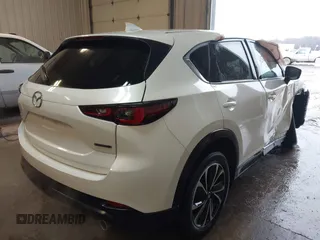 2023 Mazda CX-5 2.5 S Premium Plus Package with VIN JM3KFBEM5P0258952, listed as a IAAI auction lot 41509174 with 24,712 mi miles. Bid and sale history available at carsss.com. Image 4.