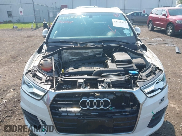 2017 Audi Q3 Premium z VIN WA1ECCFS7HR009402, wystawiony jako IAAI lot #42462248 z przebiegiem 46 536 mil mil oraz . Historia ofert i sprzedaży dostępna na DreamBid. Obrazek 6.