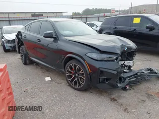 2024 BMW X6 M with VIN 5YM23ET07R9V10225, listed as a IAAI auction lot 40971354 with 1 mi miles. Bid and sale history available at carsss.com. Image 1.