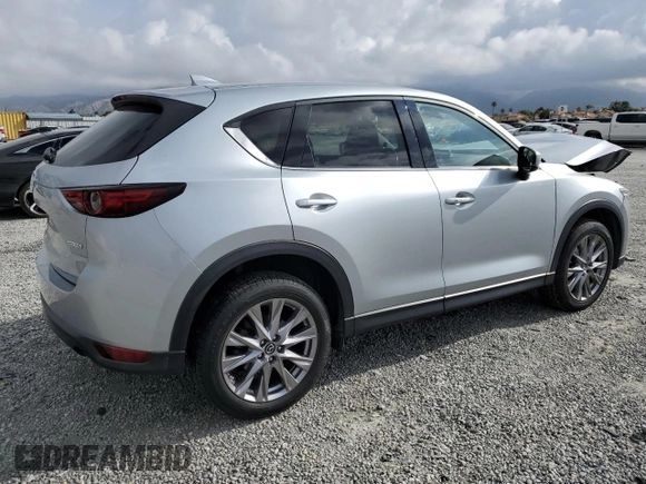 2020 Mazda CX-5 Grand Touring with VIN JM3KFADM5L0732193, listed as a Copart auction lot 51325385 with 86,798 mi miles and Salvage Title. Bid and sale history available at DreamBid. Image 3.