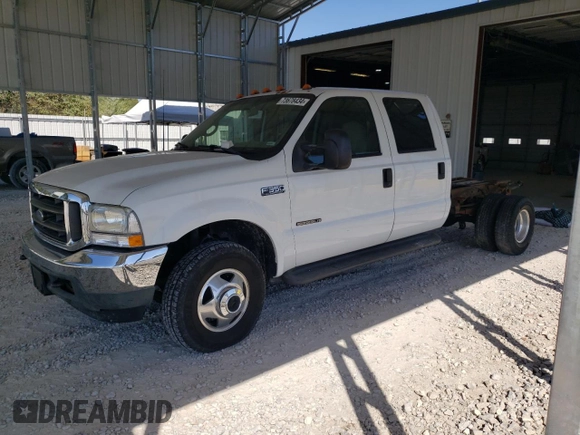 2002 Ford F-350 with VIN 1FDWW37F42EB55737, listed as a Copart auction lot 73678434 with 233,366 mi miles and Salvage title. Bid and sale history available at DreamBid. Image 1.