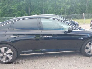 2017 Hyundai Sonata Limited z VIN KMHE34L14HA058526, wystawiony jako IAAI lot #42151314 z przebiegiem 116 131 mil mil oraz . Historia ofert i sprzedaży dostępna na DreamBid. Obrazek 14.