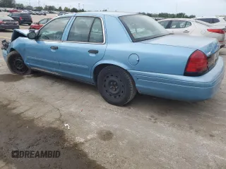 2004 Ford Police Interceptor Base w/3.27 Axle with VIN 2FAFP71W44X176595, listed as a Copart auction lot 72642164 with 136,019 mi miles and Salvage title. Bid and sale history available at DreamBid. Image 2.