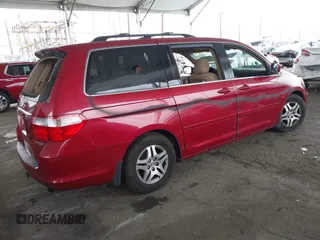 2005 Honda Odyssey EX with VIN 5FNRL38485B411954, listed as a IAAI auction lot 42039034 with 220,966 mi miles. Bid and sale history available at carsss.com. Image 4.