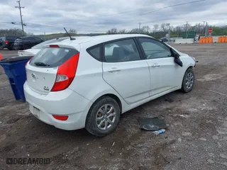 2013 Hyundai Accent GL with VIN KMHCT5AEXDU068215, listed as a IAAI auction lot 41922280 with 159,978 mi miles. Bid and sale history available at carsss.com. Image 4.