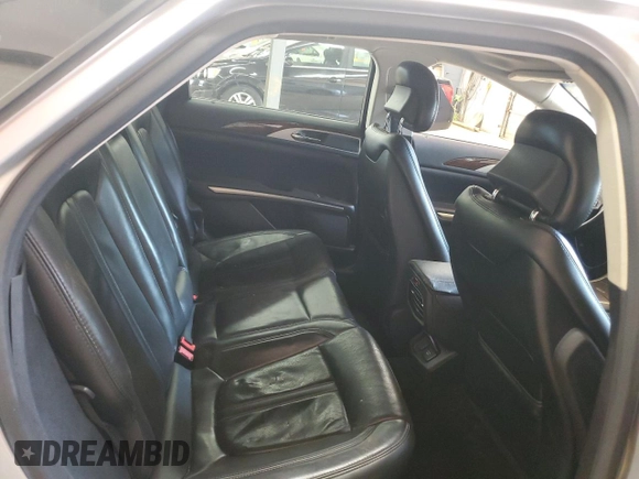 2015 Lincoln MKZ Hybrid z VIN 3LN6L2LU1FR606066, wystawiony jako Copart lot #61955415 z przebiegiem 127 214 mil mil oraz Szkoda całkowita • Salvage title. Historia ofert i sprzedaży dostępna na DreamBid. Obrazek 10.