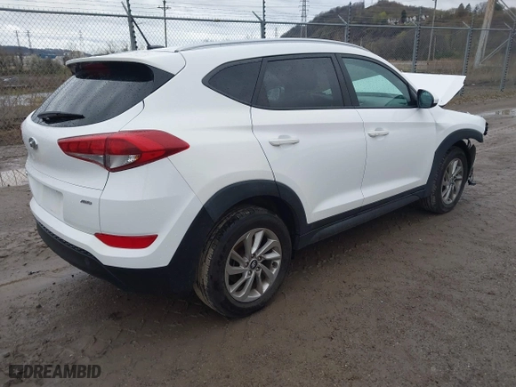 2016 Hyundai Tucson SE with VIN KM8J3CA40GU145648, listed as a IAAI auction lot 41951378 with 115,486 mi miles. Bid and sale history available at carsss.com. Image 4.