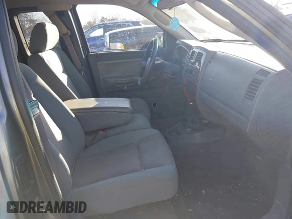 2005 Dodge Dakota SLT with VIN 1D7HW42N75S220495, listed as a IAAI auction lot 41825320 with 123,085 mi miles and . Bid and sale history available at DreamBid. Image 5.