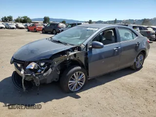 2014 Toyota Corolla L with VIN 5YFBURHE7EP104922, listed as a Copart auction lot 64613695 with 69,342 mi miles and Salvage title. Bid and sale history available at DreamBid. Image 1.