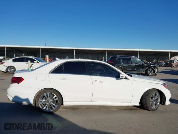 2014 Mercedes-Benz E 350 Sport z VIN WDDHF5KB6EB016413, wystawiony jako IAAI lot #40893617 z przebiegiem 151 112 mil mil oraz . Historia ofert i sprzedaży dostępna na DreamBid. Obrazek 13.