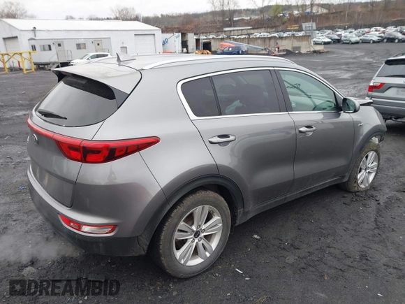 2017 Kia Sportage LX with VIN KNDPMCAC2H7238741, listed as a IAAI auction lot 41973333 with 64,714 mi miles and . Bid and sale history available at carsss.com. Image 4.