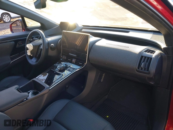2023 Toyota bZ4X XLE with VIN JTMABACA6PA041522, listed as a IAAI auction lot 41261842 with 34,171 mi miles and . Bid and sale history available at DreamBid. Image 5.