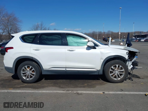 2019 Hyundai Santa Fe SEL z VIN 5NMS3CADXKH071437, wystawiony jako IAAI lot #41752902 z przebiegiem 66 980 mil mil oraz . Historia ofert i sprzedaży dostępna na DreamBid. Obrazek 13.