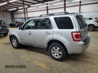 2010 Ford Escape Hybrid with VIN 1FMCU4K31AKC24086, listed as a Copart auction lot 54580895 with 194,510 mi miles and Salvage title. Bid and sale history available at DreamBid. Image 2.