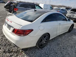 2016 Mercedes-Benz E-Class E 400 with VIN WDDKJ6FB0GF348458, listed as a Copart auction lot 87701385 with 124,867 mi miles and Salvage Title. Bid and sale history available at carsss.com. Image 3.