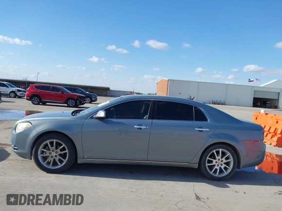 2009 Chevrolet Malibu LTZ with VIN 1G1ZK57B39F146580, listed as a IAAI auction lot 41687211 with 293,395 mi miles and . Bid and sale history available at DreamBid. Image 14.