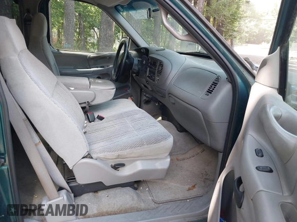 1998 Ford F-150 XL with VIN 1FTRX17L2WNA14048, listed as a IAAI auction lot 42647951 with 217,874 mi miles and . Bid and sale history available at DreamBid. Image 5.