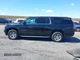 2015 Chevrolet Suburban LT z VIN 1GNSKJKC2FR162921, wystawiony jako IAAI lot #41961114 z przebiegiem 296 918 mil mil oraz . Historia ofert i sprzedaży dostępna na DreamBid. Obrazek 15.