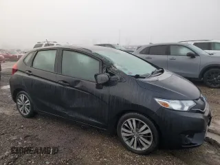 2015 Honda Fit EX-L with VIN 3HGGK5H82FM703509, listed as a Copart auction lot 86336004 with 155,193 mi miles and Salvage Title. Bid and sale history available at DreamBid. Image 4.