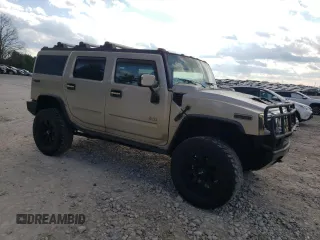 2003 Hummer H2 with VIN 5GRGN23U93H101021, listed as a Copart auction lot 87440524 with 124,826 mi miles and Clean Title. Bid and sale history available at carsss.com. Image 4.