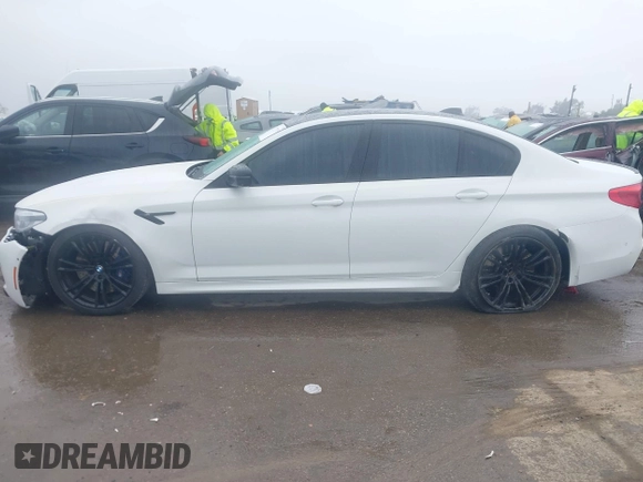 2019 BMW M5 Competition z VIN WBSJF0C52KB447102, wystawiony jako IAAI lot #41778593 z przebiegiem 31 030 mil mil oraz . Historia ofert i sprzedaży dostępna na DreamBid. Obrazek 14.