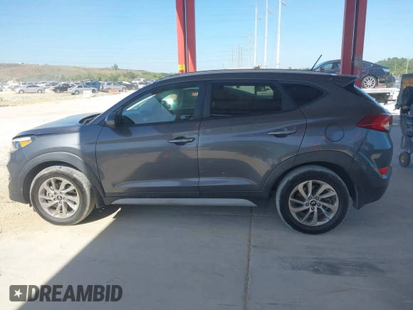 2017 Hyundai Tucson SE with VIN KM8J33A4XHU438510, listed as a IAAI auction lot 42021812 with 117,848 mi miles. Bid and sale history available at carsss.com. Image 14.