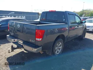 2012 Nissan Titan SV with VIN 1N6AA0EDXCN325756, listed as a IAAI auction lot 42025837 with 218,658 mi miles. Bid and sale history available at carsss.com. Image 4.