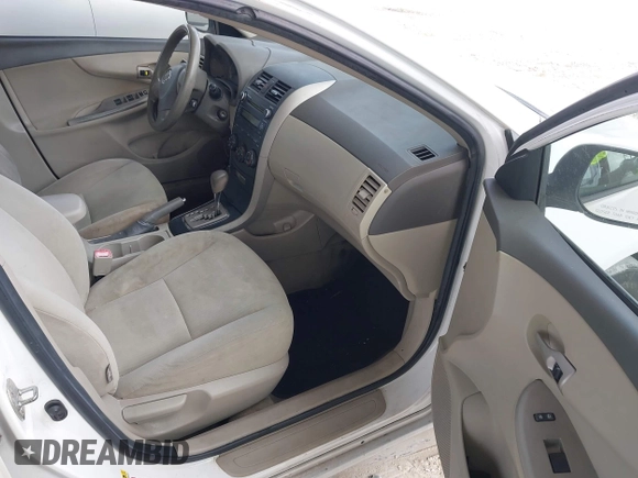 2010 Toyota Corolla with VIN 1NXBU4EE0AZ335239, listed as a IAAI auction lot 42155710 with 215,134 mi miles. Bid and sale history available at carsss.com. Image 5.