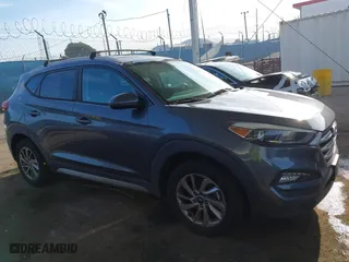 2017 Hyundai Tucson SE Plus with VIN KM8J33A40HU329666, listed as a IAAI auction lot 42084886 with 144,785 mi miles. Bid and sale history available at carsss.com. Image 13.