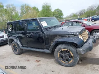2014 Jeep Wrangler Unlimited Sahara with VIN 1C4BJWEG6EL189712, listed as a IAAI auction lot 42043053 with 108,716 mi miles. Bid and sale history available at carsss.com. Image 13.