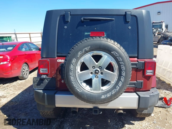 2008 Jeep Wrangler Unlimited Sahara с VIN 1J4GA59118L594851, выставлен на аукционе IAAI как лот 41643490 с пробегом 59 421 миль миль и . История ставок и продаж доступна на DreamBid. Изображение 17.