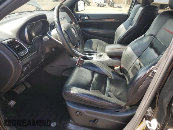 2019 Jeep Grand Cherokee Trailhawk with VIN 1C4RJFLT8KC726784, listed as a Copart auction lot 66010235 with 136,683 mi miles and Salvage title. Bid and sale history available at DreamBid. Image 7.