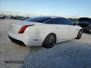 2018 Jaguar XJ with VIN SAJWA1C77J8W14750, listed as a Copart auction lot 87273204 with 51,040 mi miles and Clean Title. Bid and sale history available at carsss.com. Image 3.
