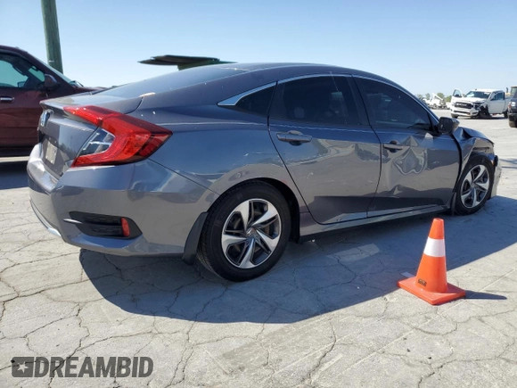 2019 Honda Civic LX with VIN 19XFC2F68KE003117, listed as a Copart auction lot 53500705 with 46,397 mi miles and Salvage Title. Bid and sale history available at DreamBid. Image 3.