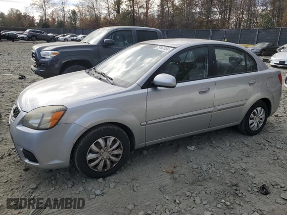 2010 Kia Rio LX with VIN KNADH4A38A6627955, listed as a Copart auction lot 43702265 with 138,005 mi miles and Non Repairable. Bid and sale history available at carsss.com. Image 1.