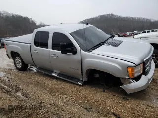 2013 GMC Sierra 2500HD SLT with VIN 1GT121E83DF217046, listed as a Copart auction lot 86259994 with 160,088 mi miles and Salvage title. Bid and sale history available at DreamBid. Image 4.
