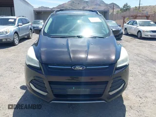 2013 Ford Escape SE z VIN 1FMCU9GX4DUC94117, wystawiony jako IAAI lot #42394333 z przebiegiem 261 392 mil mil oraz . Historia ofert i sprzedaży dostępna na DreamBid. Obrazek 6.