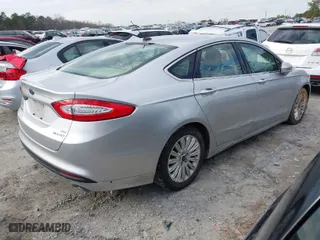 2015 Ford Fusion SE Hybrid with VIN 3FA6P0LU2FR166877, listed as a IAAI auction lot 41586973 with 58,428 mi miles. Bid and sale history available at carsss.com. Image 4.