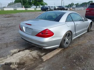 2003 Mercedes-Benz SL 500 z VIN WDBSK75F93F027609, wystawiony jako IAAI lot #42386934 z przebiegiem Nie podano mil oraz . Historia ofert i sprzedaży dostępna na DreamBid. Obrazek 4.