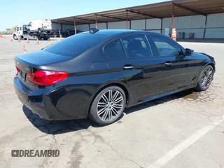2017 BMW 5 Series 540i with VIN WBAJE5C31HG477822, listed as a IAAI auction lot 42174024 with 88,846 mi miles and . Bid and sale history available at carsss.com. Image 4.