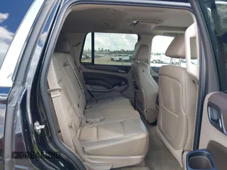 2015 Chevrolet Tahoe LT with VIN 1GNSCBKCXFR214072, listed as a IAAI auction lot 40512435 with 98,955 mi miles and . Bid and sale history available at DreamBid. Image 8.