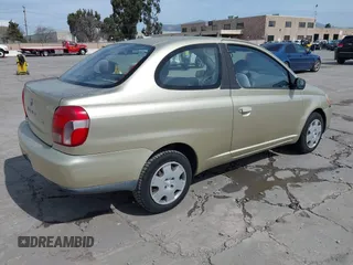 2000 Toyota ECHO with VIN JTDAT1231Y5008292, listed as a IAAI auction lot 41867210 with 116,408 mi miles and . Bid and sale history available at DreamBid. Image 4.